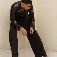NOIR PALAZZO TROUSERS